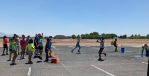 cropped relay race with water