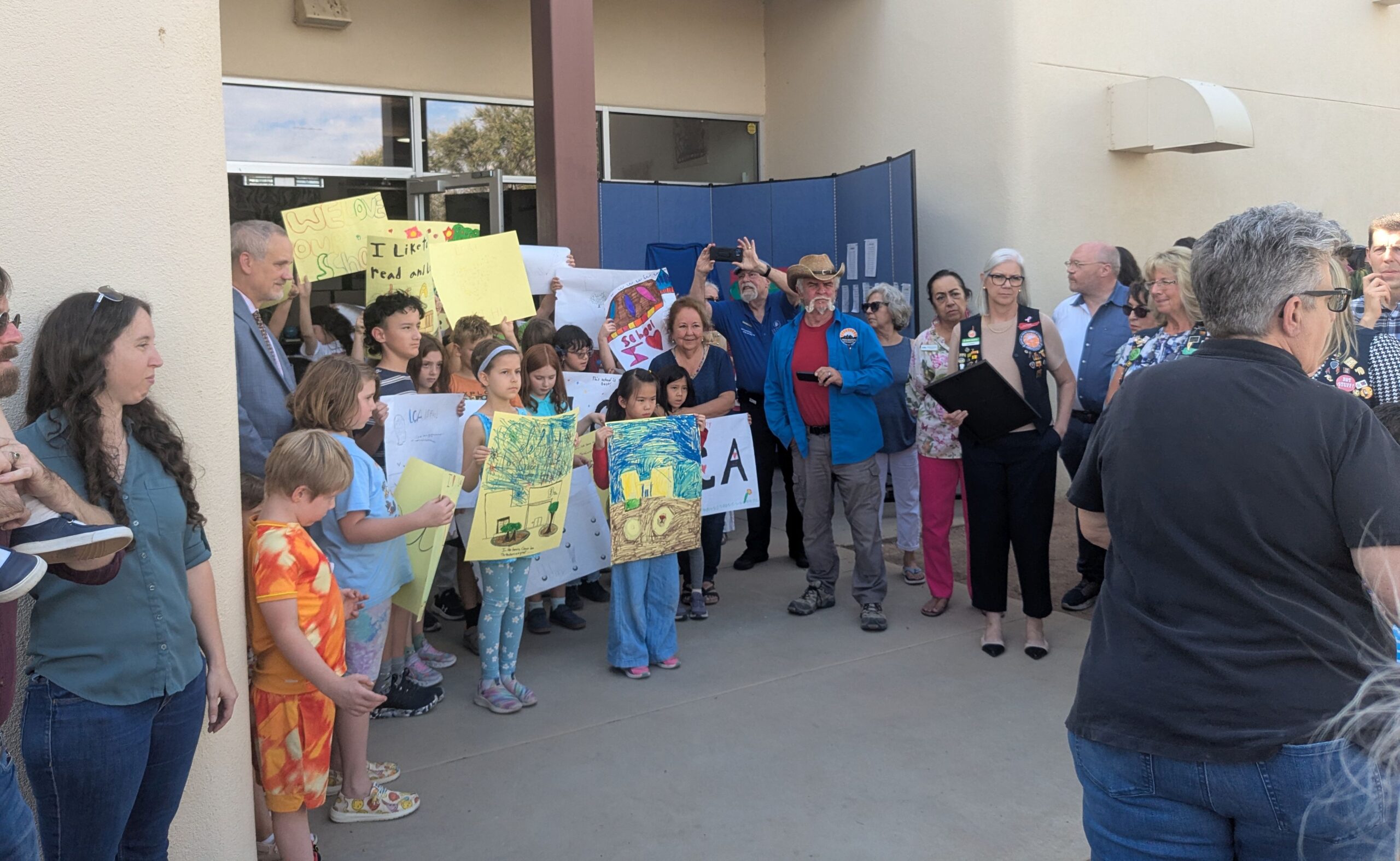 ribbon cutting gathering wide
